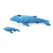The two plush whales shown separated. The larger parent whale has a round black piece of velcro on its head where the baby whale attaches.