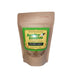 Brown craft resealable bag of dog cookies with a green and yellow label and a clear window showing brown cookies.